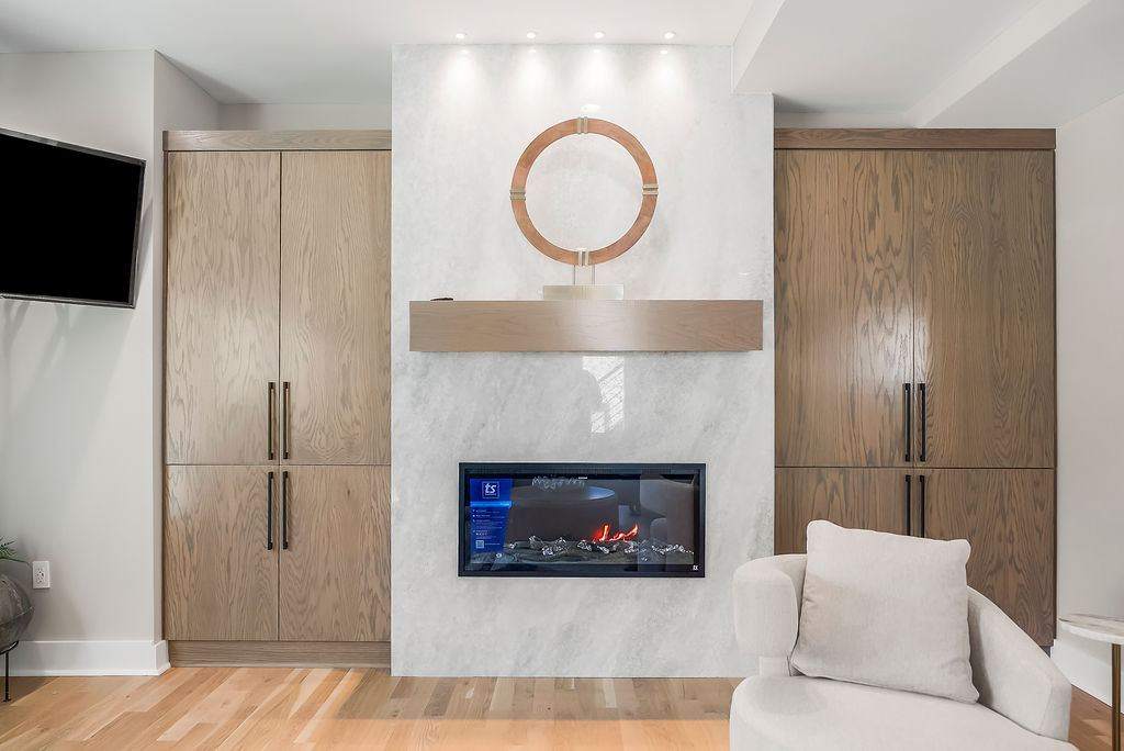 Living room fireplace lounge in a furnished extended-stay home
