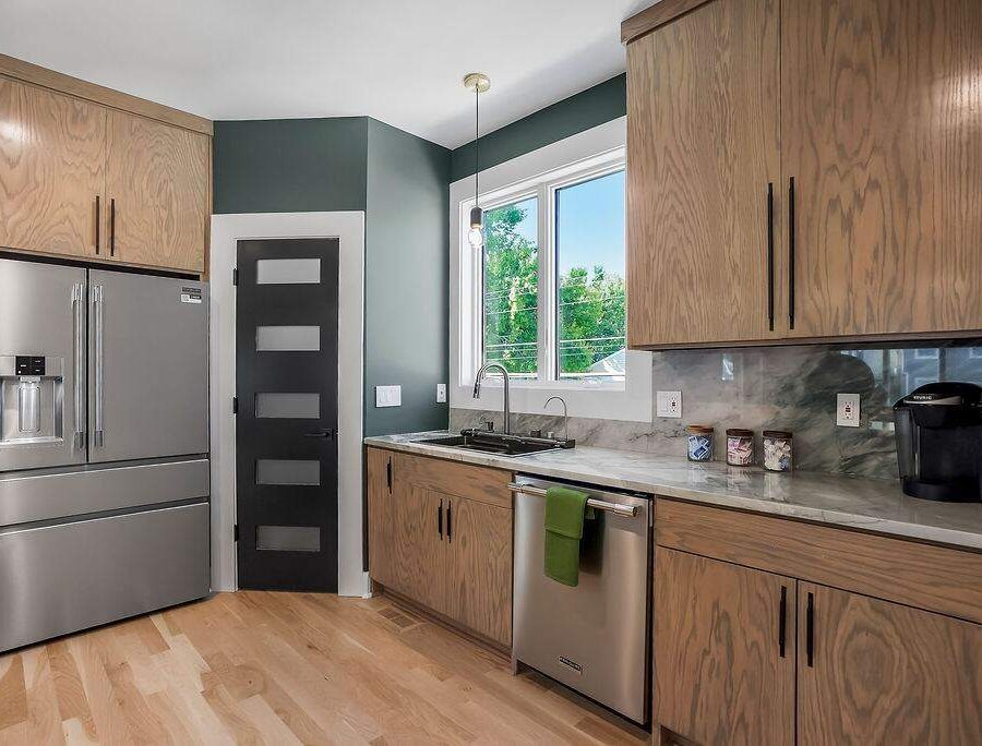 Stainless steel appliances in a fully equipped corporate housing kitchen
