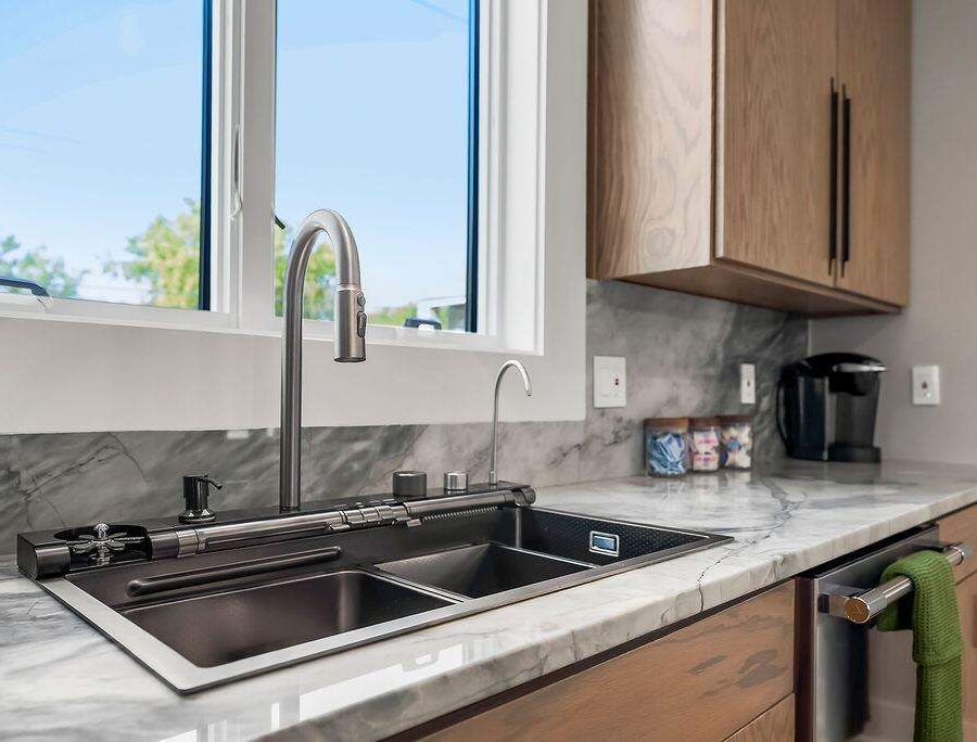 Kitchen sink with garden window in furnished rental home