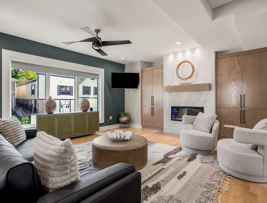 Furnished living room lounge area with designer decor