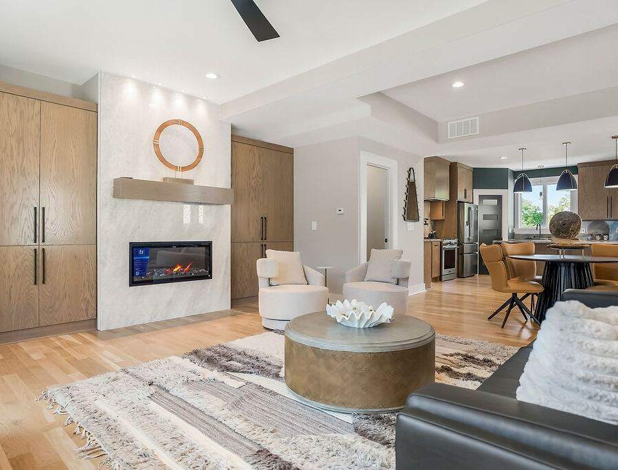 Sunlit living room with modern furnishings in furnished apartment
