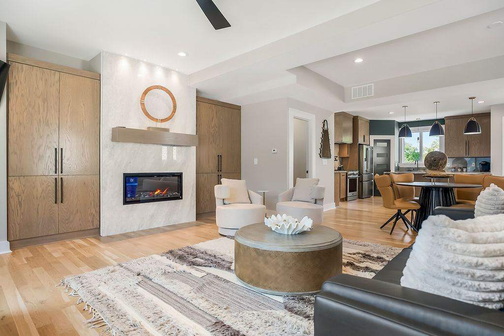 Sunlit living room with modern furnishings in furnished apartment