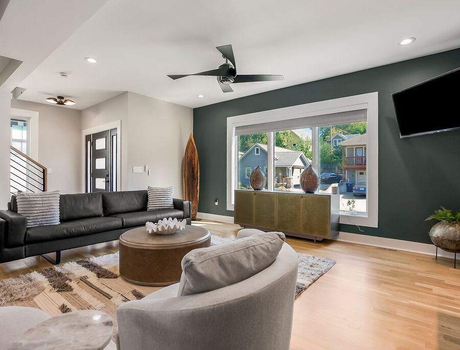 Living room with plush sectional seating in a furnished executive rental
