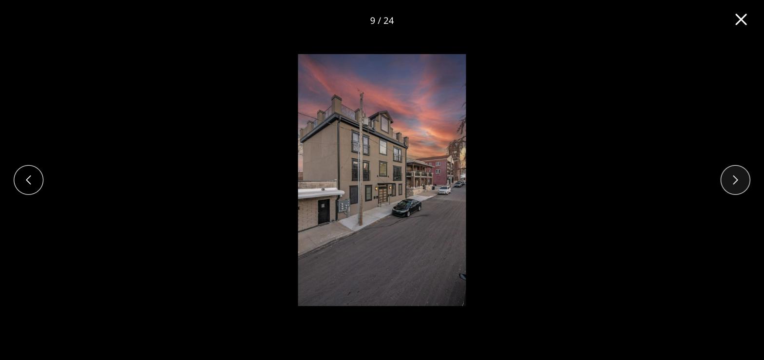 Exterior of a multi-unit residential building constructed by Hickok Homes, representative of apartment construction near Gilbert, AZ
