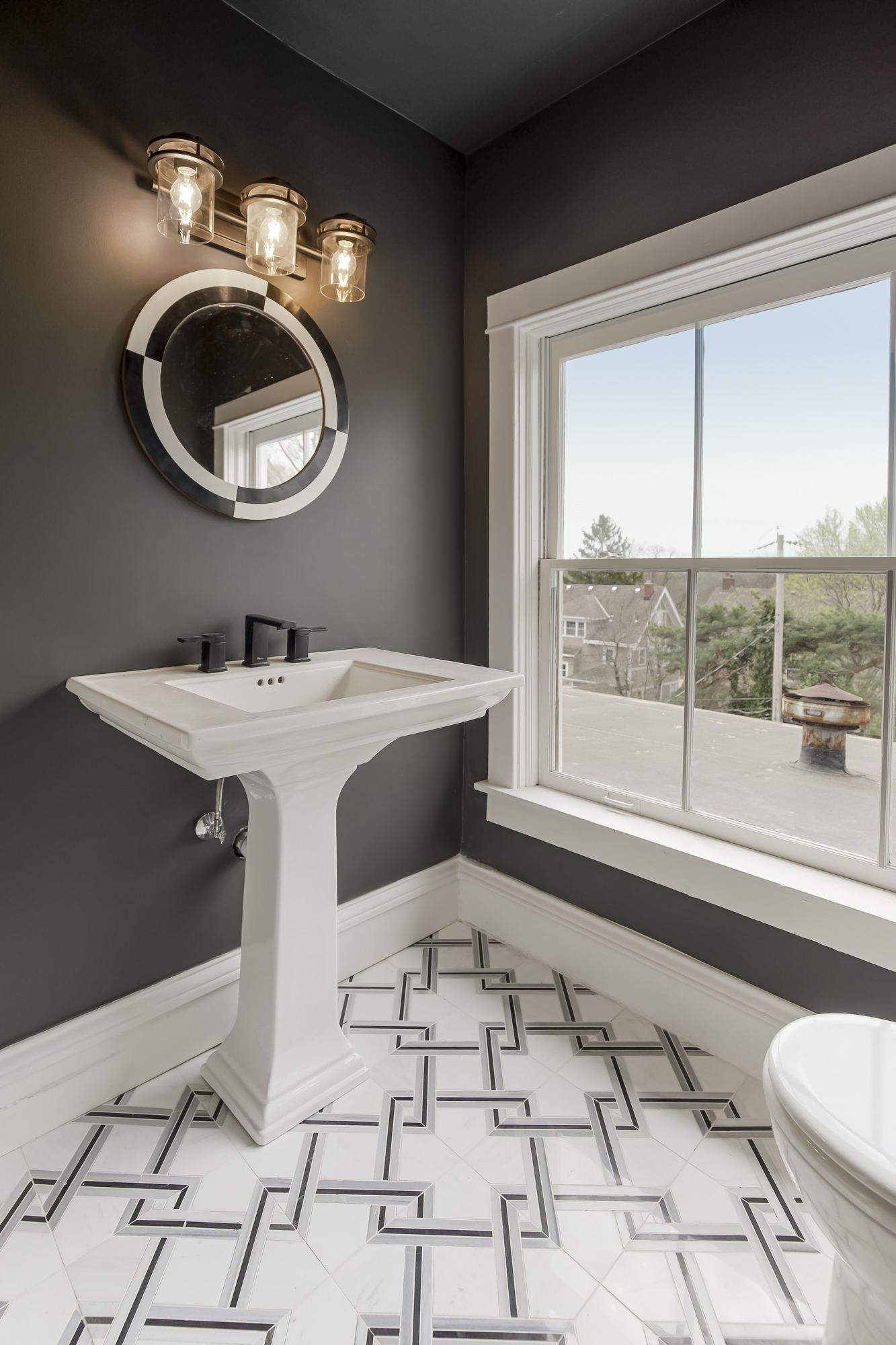 Custom bathroom remodel with pedestal sink in Kansas City, MO