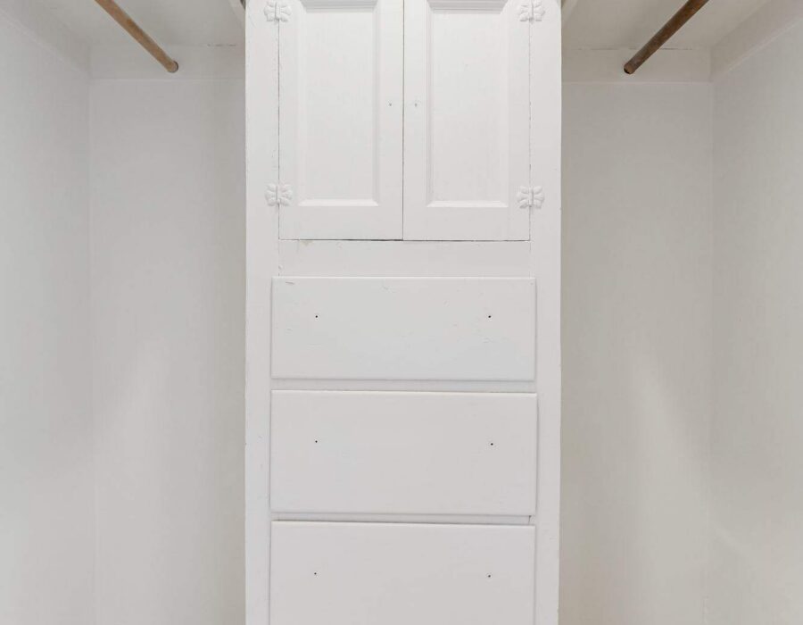 Custom built-in closet and storage system added during renovation