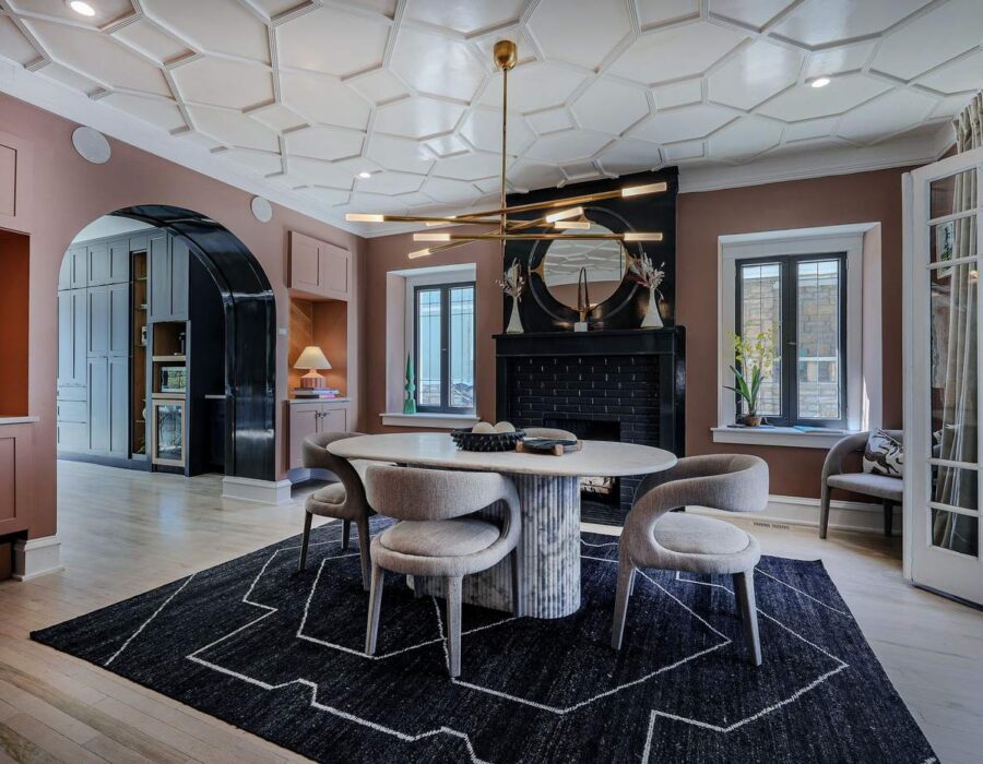 Renovated dining room with fireplace and custom millwork