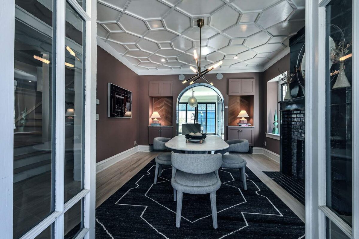 Formal dining room with sculptural coffered ceiling after a Hickok Homes whole-home remodel