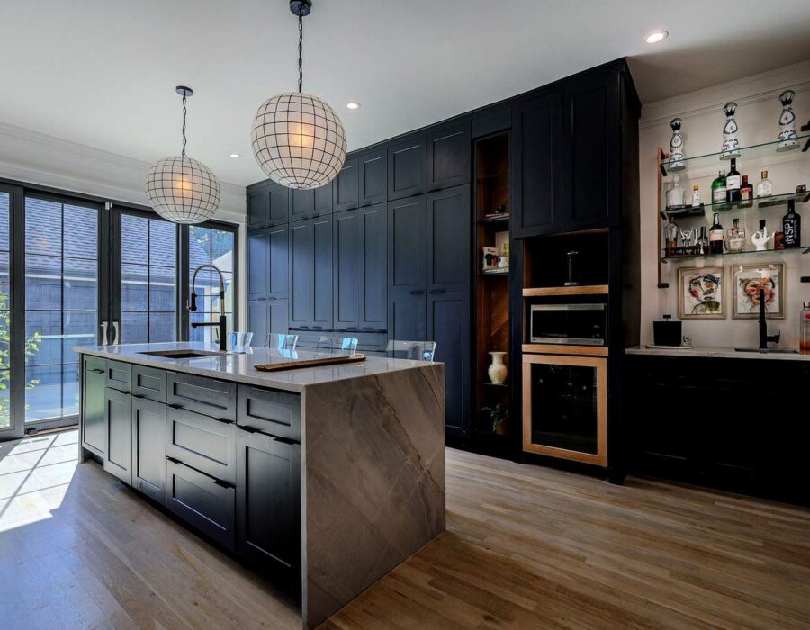 Whole-home kitchen remodel with oversized island and pendant lighting