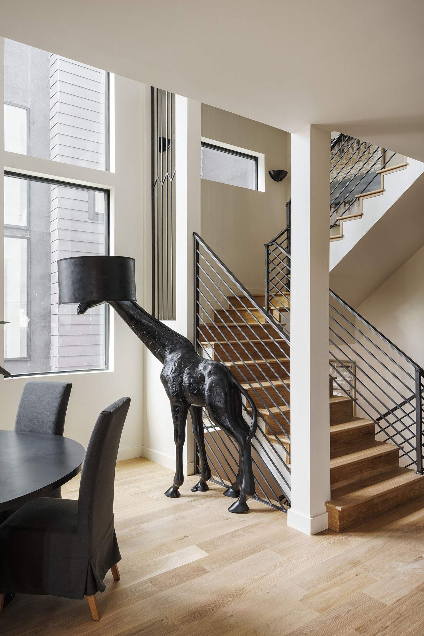 Dining area and staircase in a multi-unit residential property, Hickok Homes construction near Litchfield Park, AZ