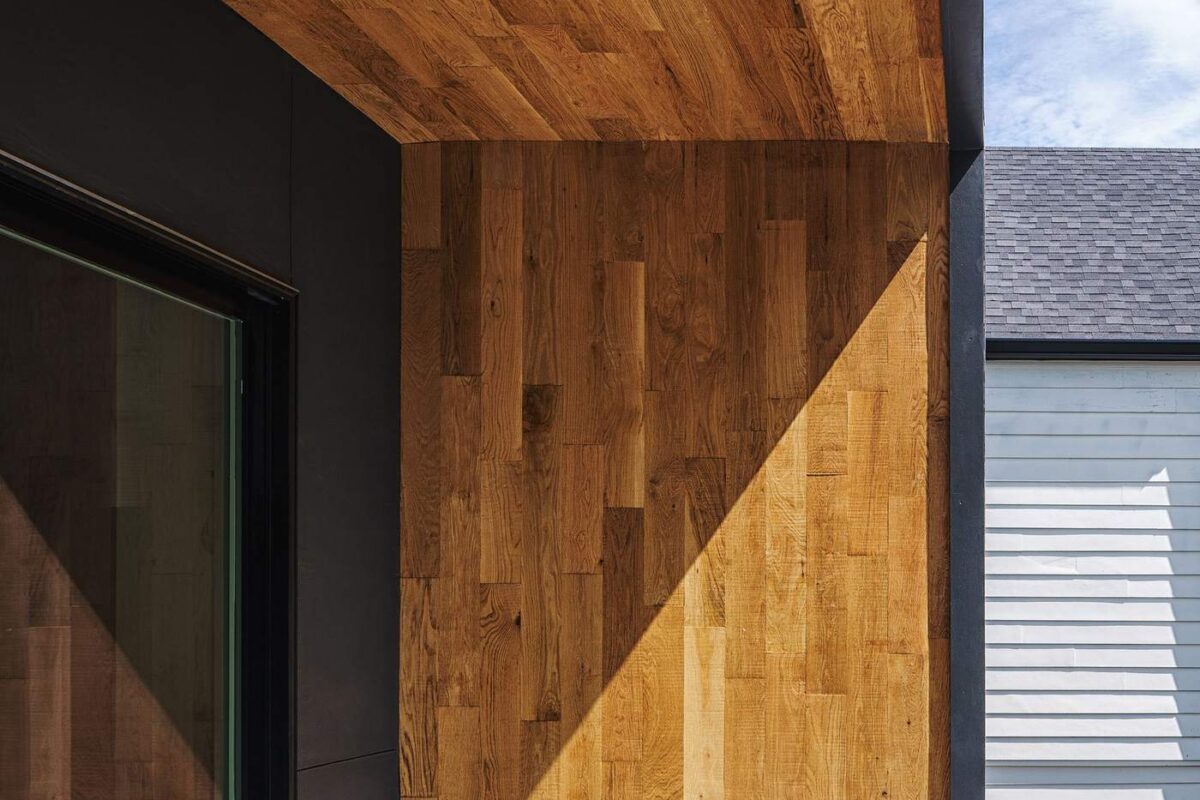 Exterior wood ceiling and siding detail on a custom-built home