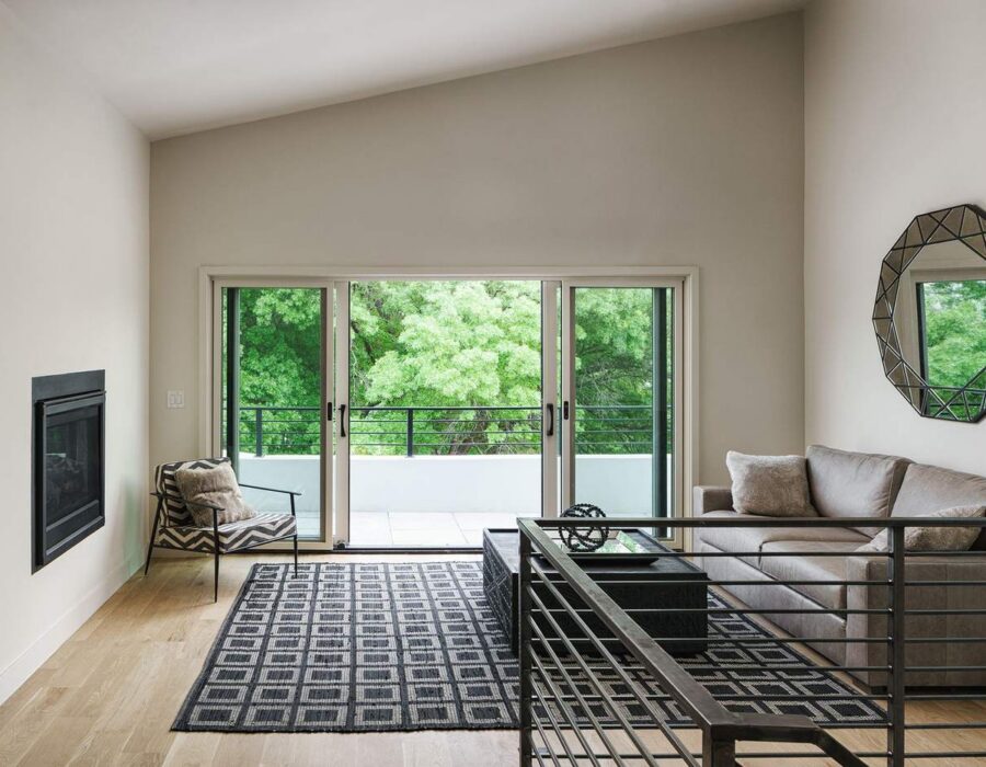 Living room filled with natural light and minimalist furnishings