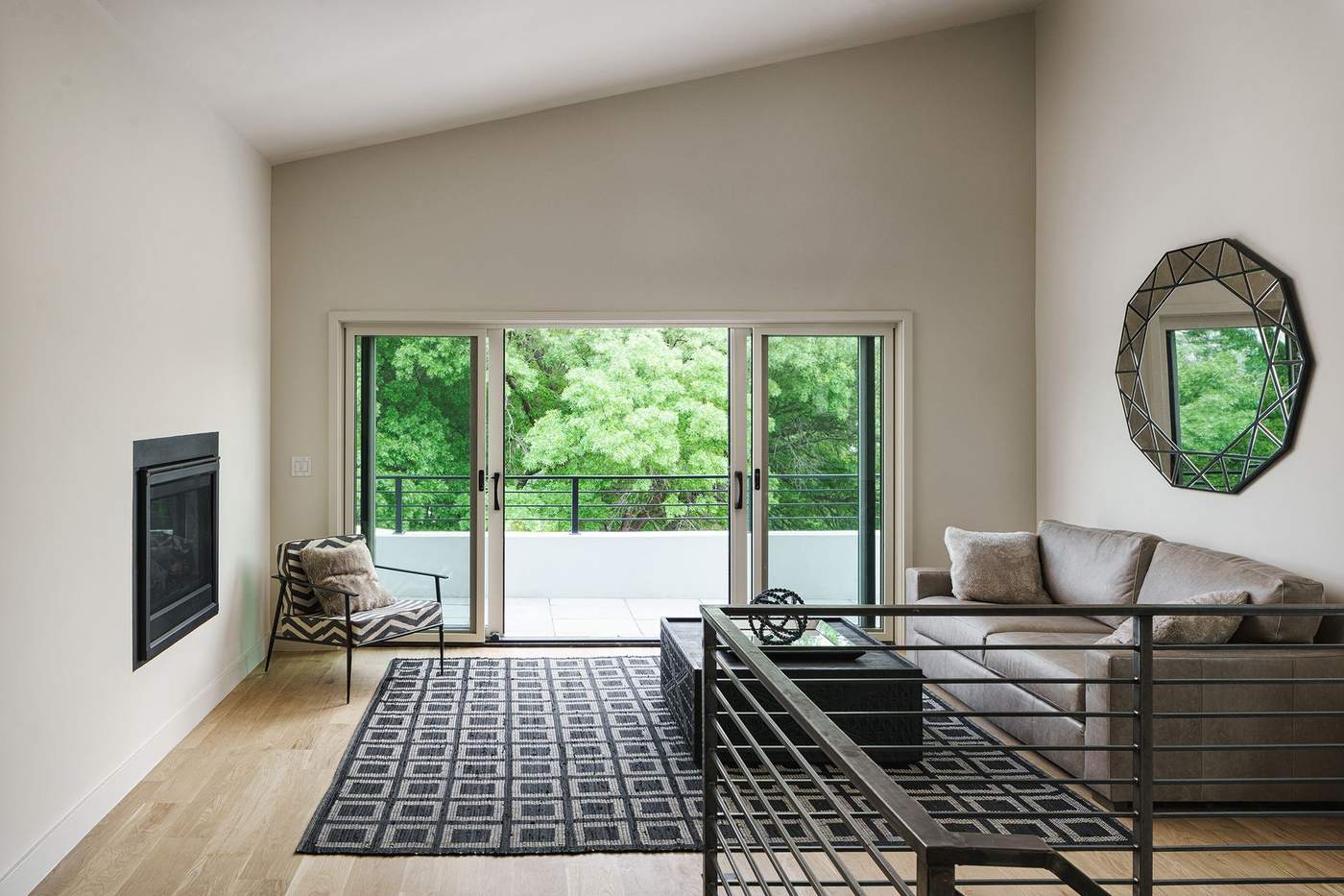 Living room filled with natural light and minimalist furnishings